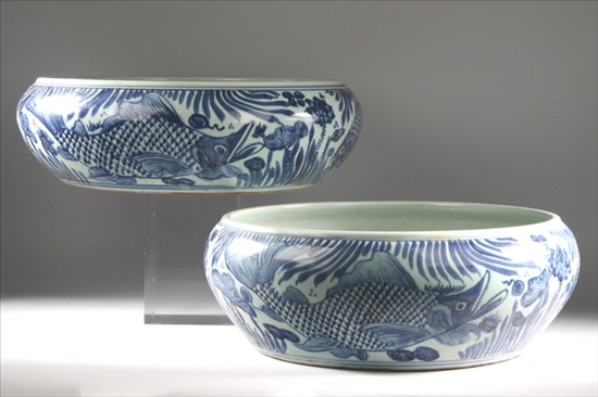 Appraisal: PAIR CHINESE BLUE AND WHITE PORCELAIN BOWLS th century Fish