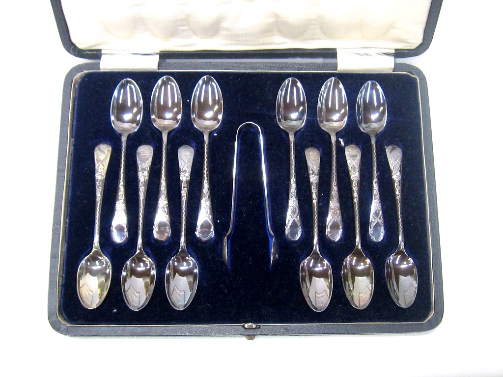 Appraisal: Cased set of twelve silver spoons with tongs Sheffield