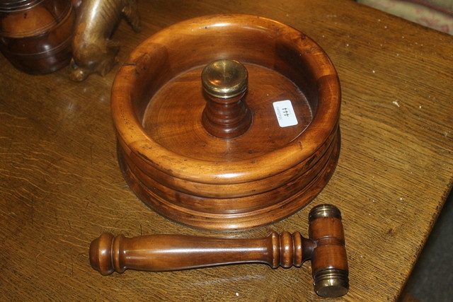 Appraisal: A WOODEN NUT CRACKER BOWL with central brass anvil and