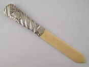 Appraisal: A late Victorian silver handled ivory page turner letter opener