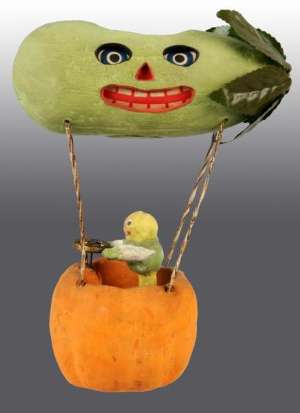 Appraisal: Halloween Veggie Man Driving Pickle Balloon Description Rare Jack-O-Lantern Condition