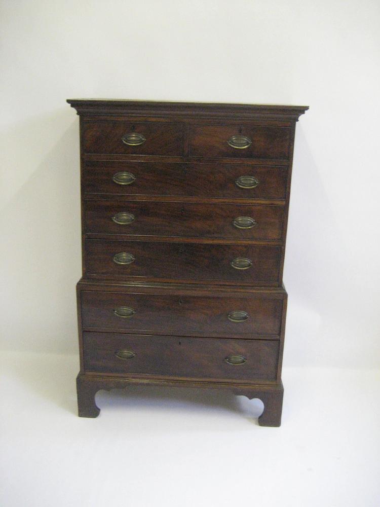 Appraisal: A GEORGE III MAHOGANY CHEST ON CHEST early th century