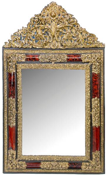 Appraisal: A Continental Baroque style ebonized tortoiseshell and brass mounted mirrorsecond