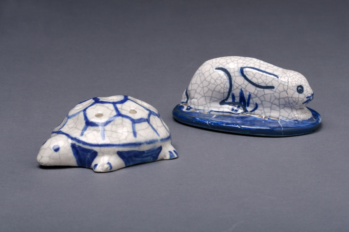 Appraisal: DEDHAM POTTERY TURTLE FLOWER HOLDER The shell defined in blue