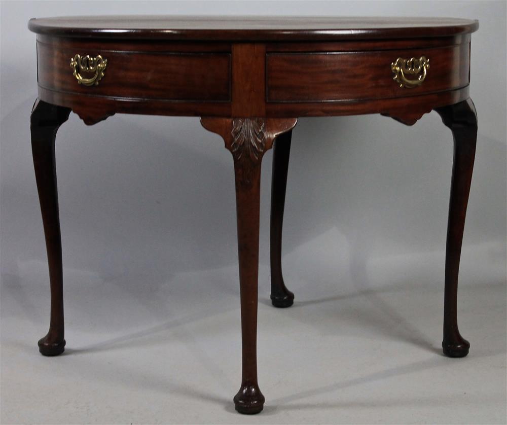 Appraisal: GEORGIAN CARVED MAHOGANY DEMILUNE CARD TABLE possibly Irish having a