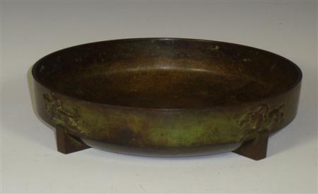 Appraisal: An Art Deco patinated bronze bowl of circular form moulded