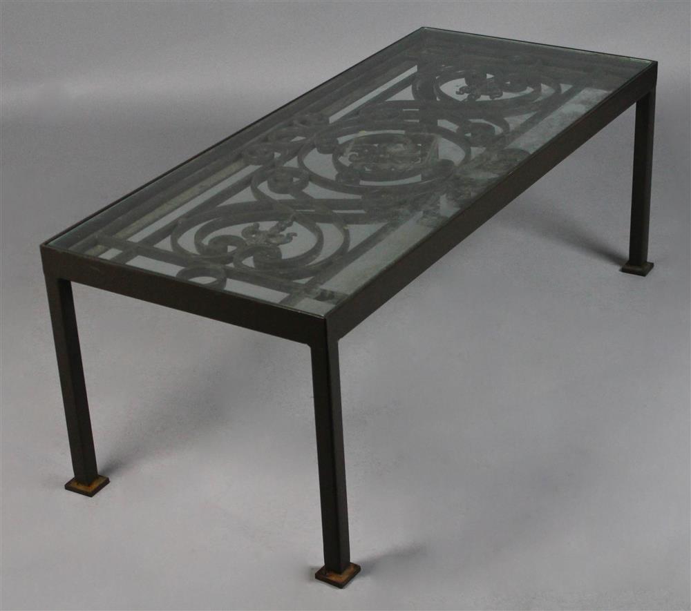 Appraisal: CONTEMPORARY GLASS TOPPED COFFEE TABLE COMPOSED WITH AN ANTIQUE METAL