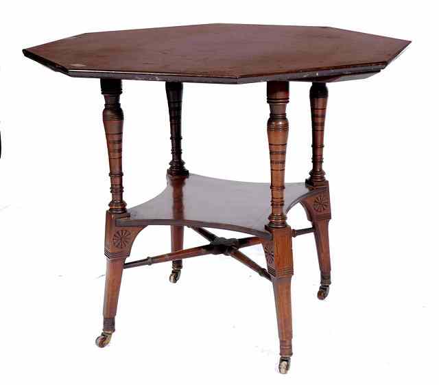 Appraisal: AN ARTS AND CRAFTS MAHOGANY OCTAGONAL CENTRE TABLE on ring