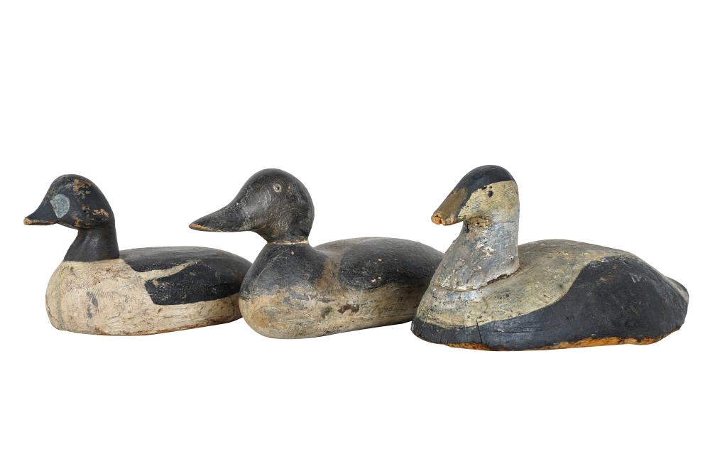 Appraisal: THREE DUCK DECOYSCondition with extensive wear to paint losses to