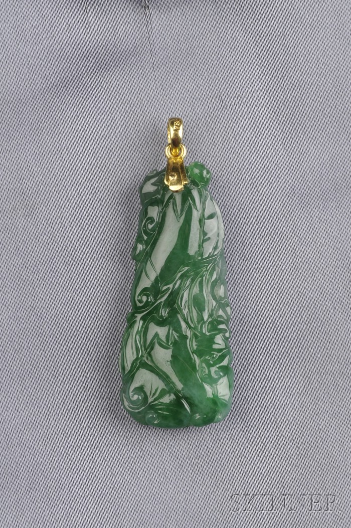 Appraisal: Carved Jadeite Pendant depicting flowers and gourds measuring approx x