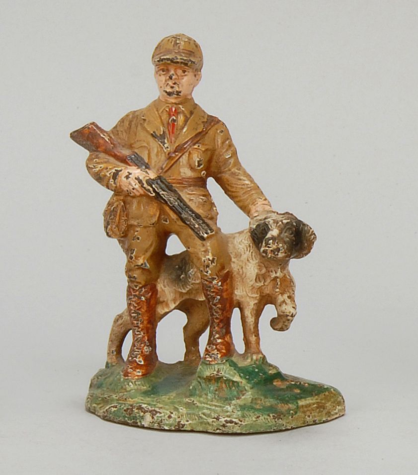 Appraisal: PAINTED CAST IRON DOORSTOP In the form of a hunter