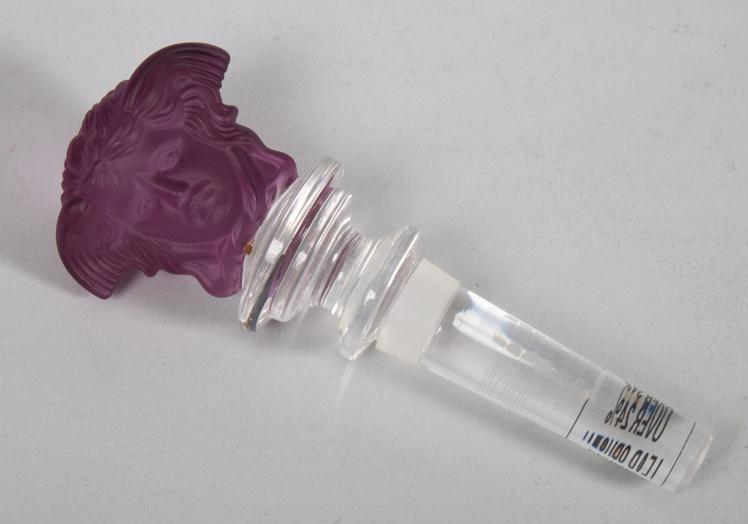 Appraisal: Versace crystal wine bottle stopper partially frosted amethyst crystal double-side