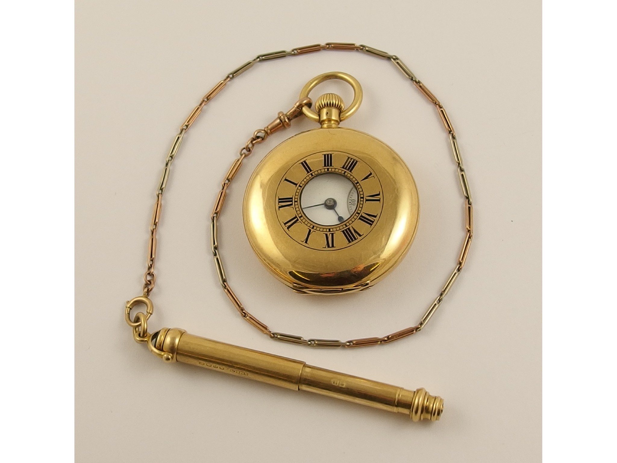 Appraisal: An ct half hunter pocket watch fob chain and propelling