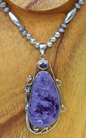 Appraisal: Native American silver content unknown pendant necklace bezel-set purple charoite