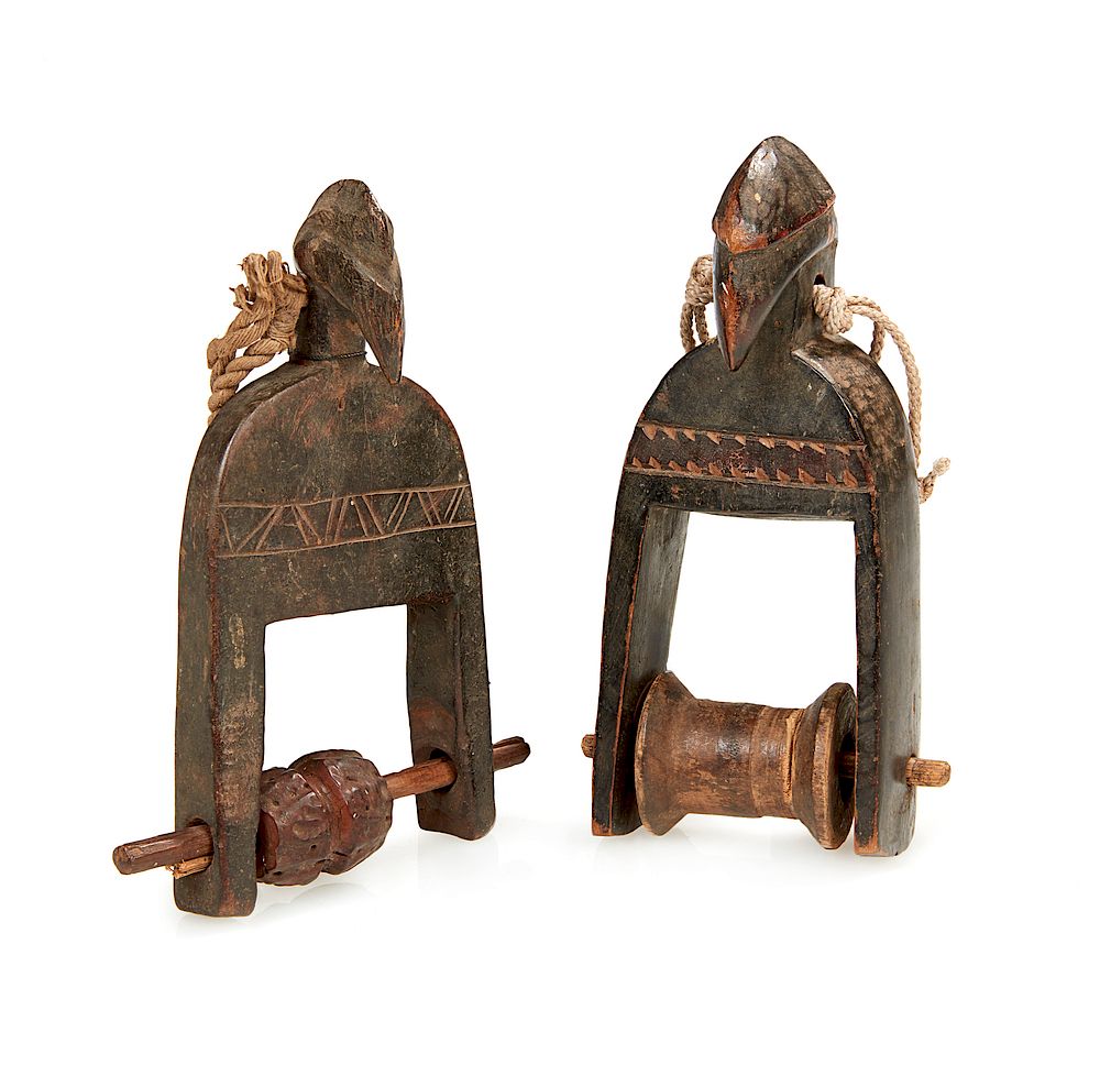 Appraisal: Two Senufo Bird Head Heddle Pulleys Two Senufo bird head