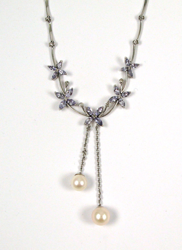 Appraisal: DIAMOND AND PEARL NECKLACE The k white gold necklaces is