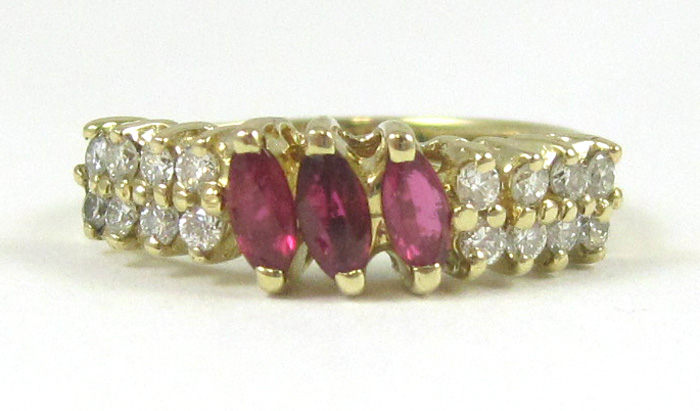 Appraisal: RUBY DIAMOND AND FOURTEEN KARAT GOLD RING set with three