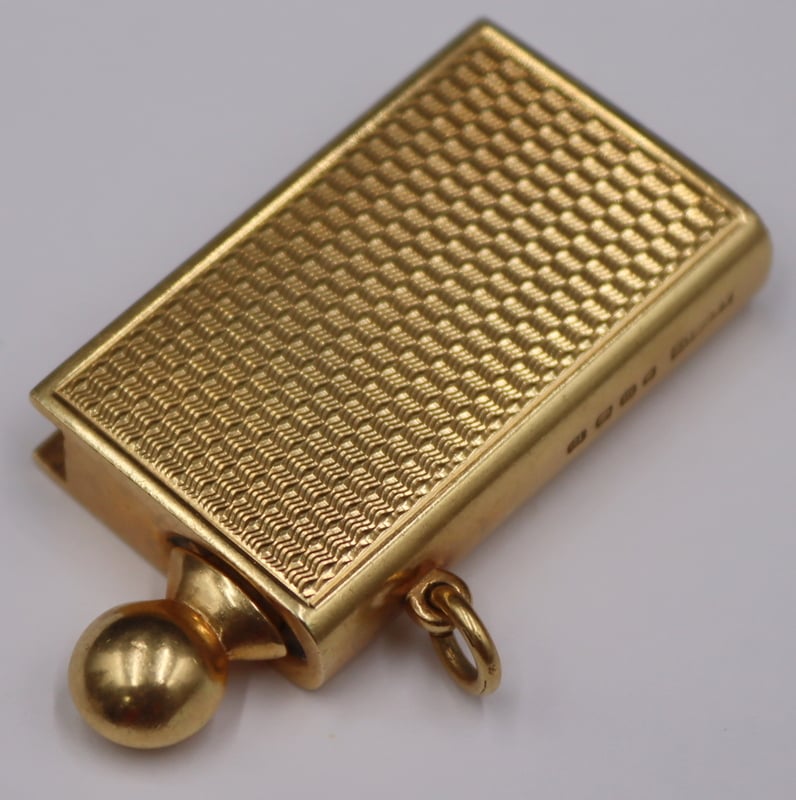 Appraisal: GOLD ASPREY CO LTD KT GOLD MATCH STRIKE Pendant Asprey