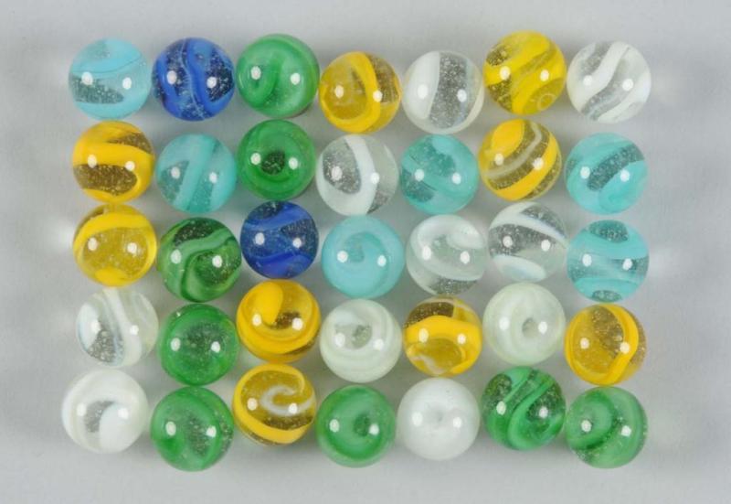 Appraisal: Assortment of Machine-Made Cyclone Marbles Description Includes approximately marbles Not