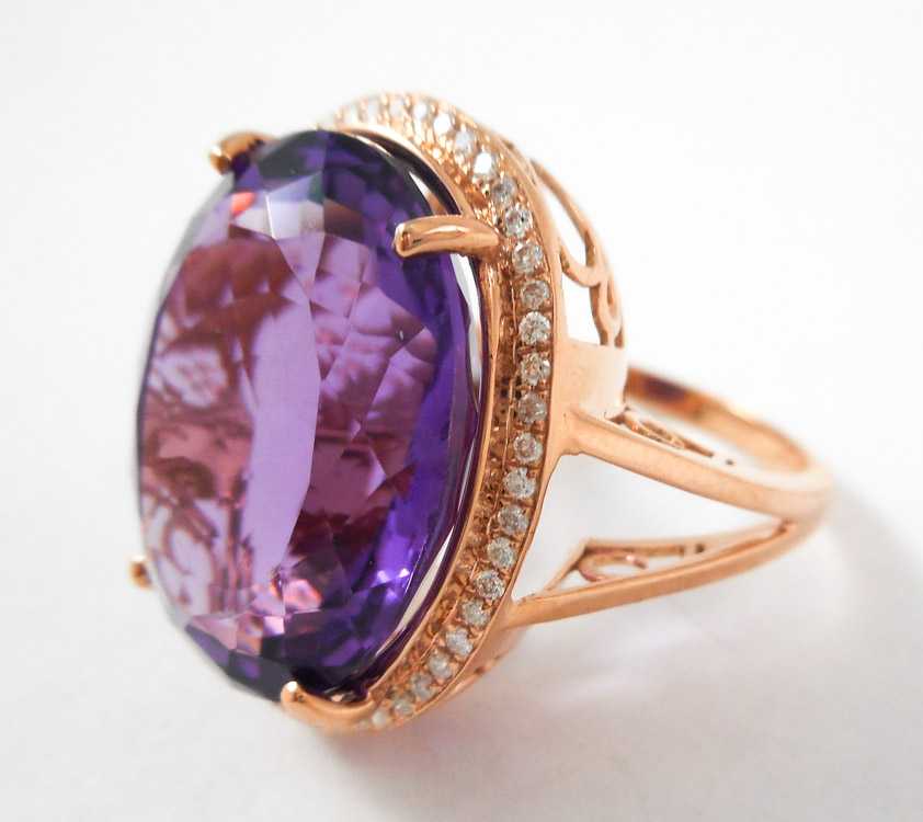 Appraisal: AMETHYST DIAMOND AND FOURTEEN KARAT GOLD RING The rose gold