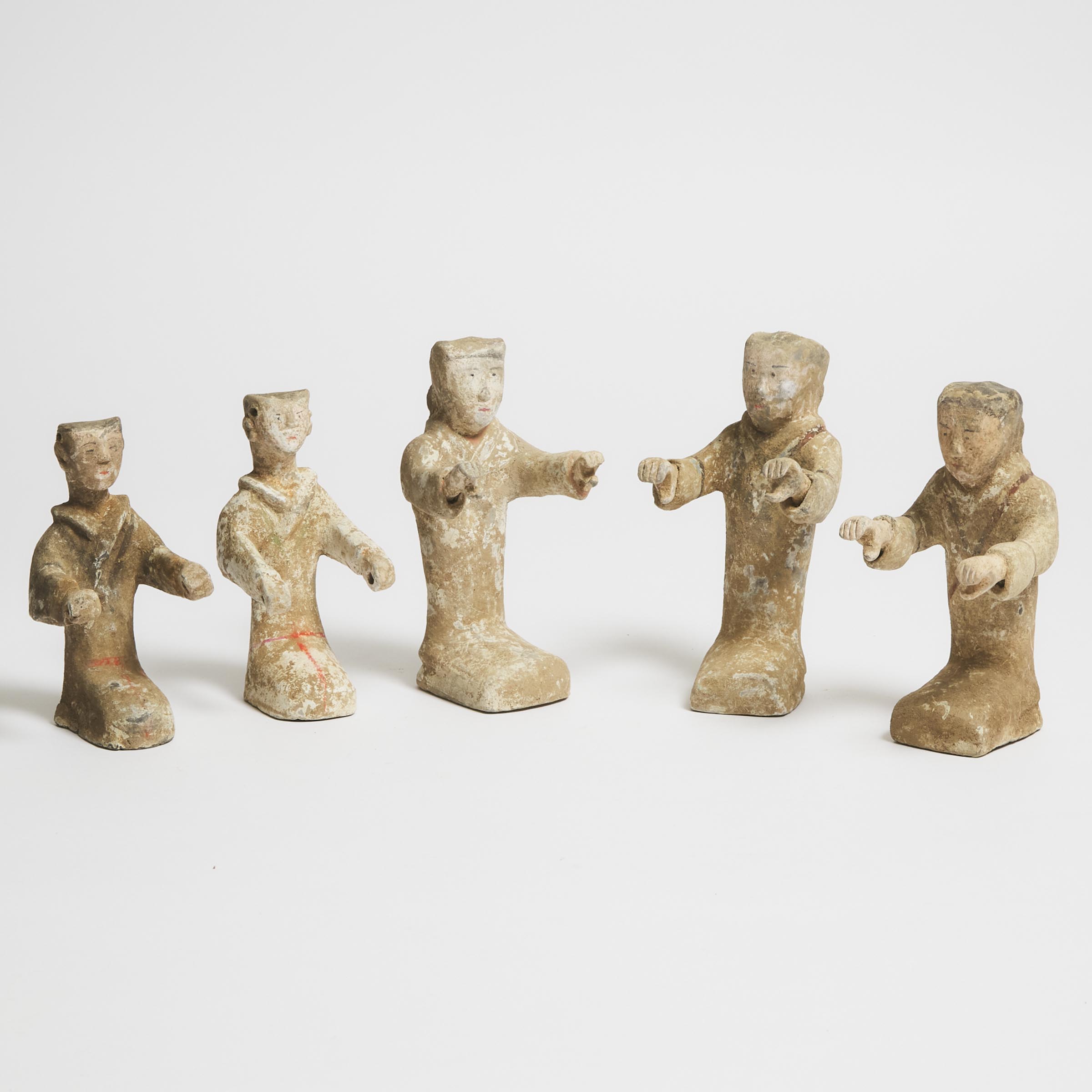 Appraisal: A Group of Five Painted Pottery Kneeling Figures Han Dynasty