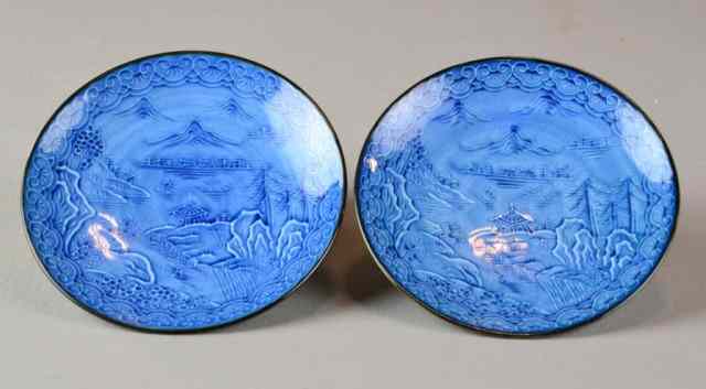 Appraisal: SMALL MATCHING JAPANESE BLUE PLATESTwo plates with embossed landscape scenery