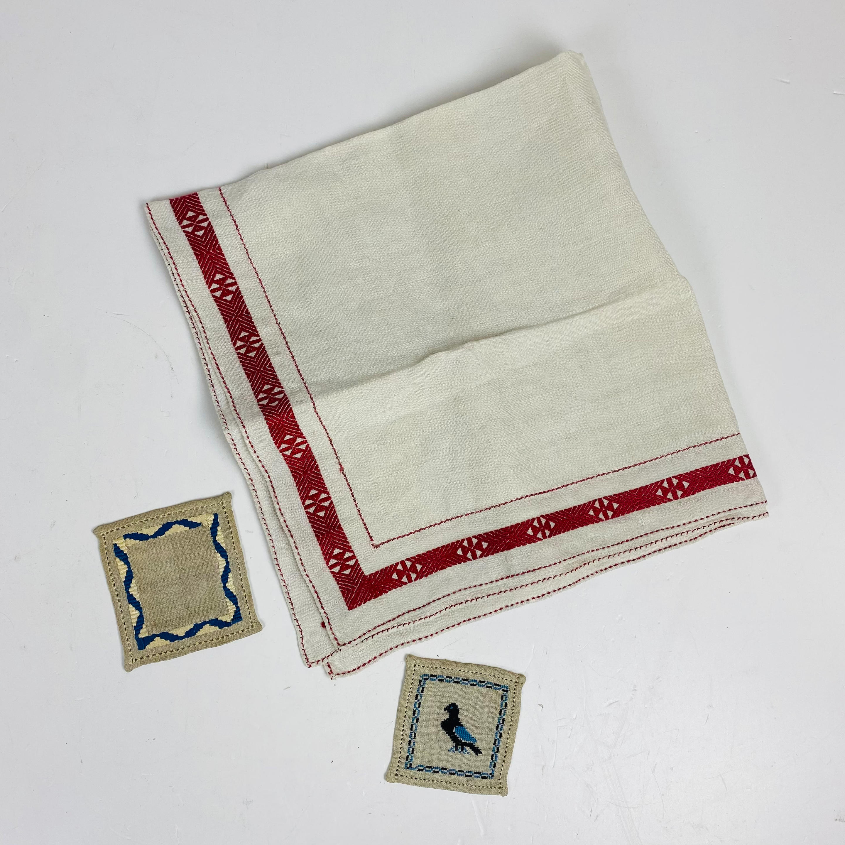 Appraisal: THREE NEEDLEWORK TEXTILES FROM GRENFELL MISSION Newfoundland and Labrador Canada