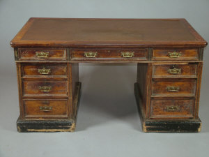 Appraisal: A late Victorian mahogany twin pedestal partners desk with leather