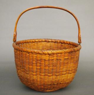 Appraisal: Nantucket Lightship basket A late th century Nantucket Lightship basket