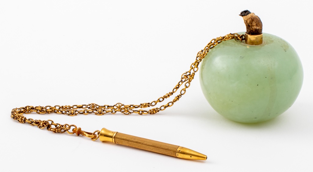 Appraisal: JADE-COLORED SOAPSTONE APPLE PAPERWEIGHT W PEN Jade-colored soapstone apple-shaped paperweight