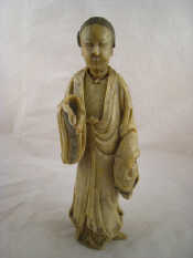 Appraisal: A Chinese hardstone figure with separate head and hand hand