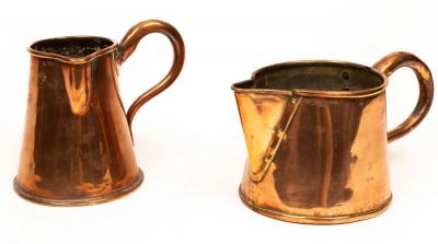 Appraisal: A Georgian copper ale jug cm high and a copper