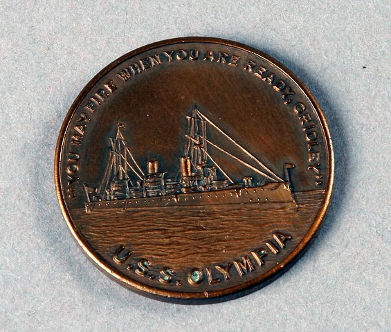 Appraisal: USS Olympia commemorative coin made from the propeller of the