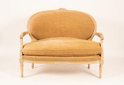 Appraisal: A two seat settee with upholstered back and seat on