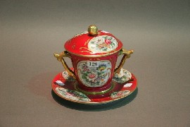 Appraisal: A Limoges cache pot and saucer with floral medallions