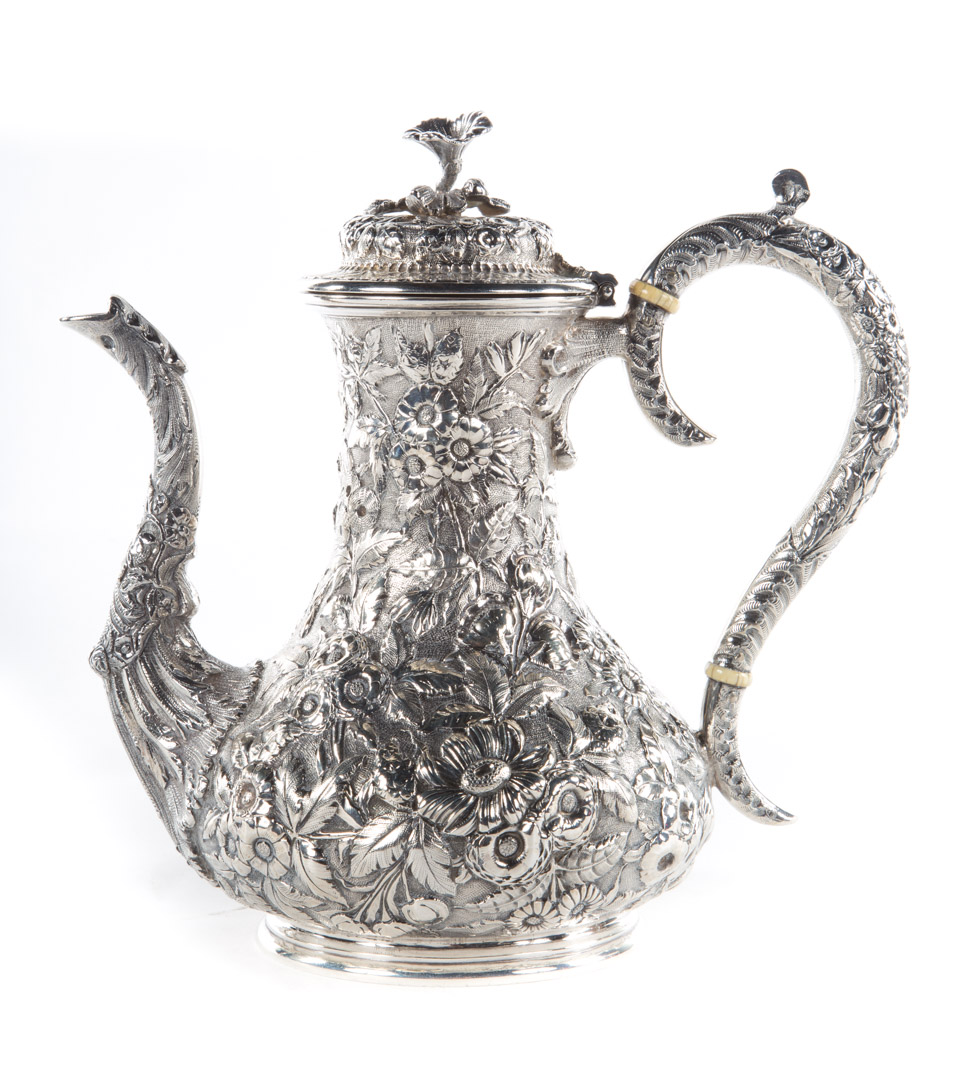 Appraisal: Kirk repousse coin silver teapot fourth quarter- th century in