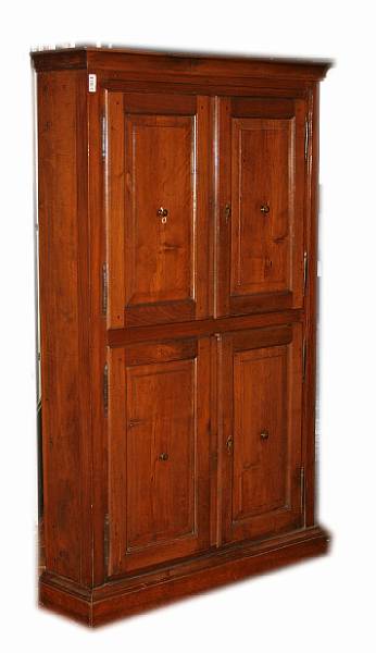 Appraisal: A French walnut cupboard th century height ft width in