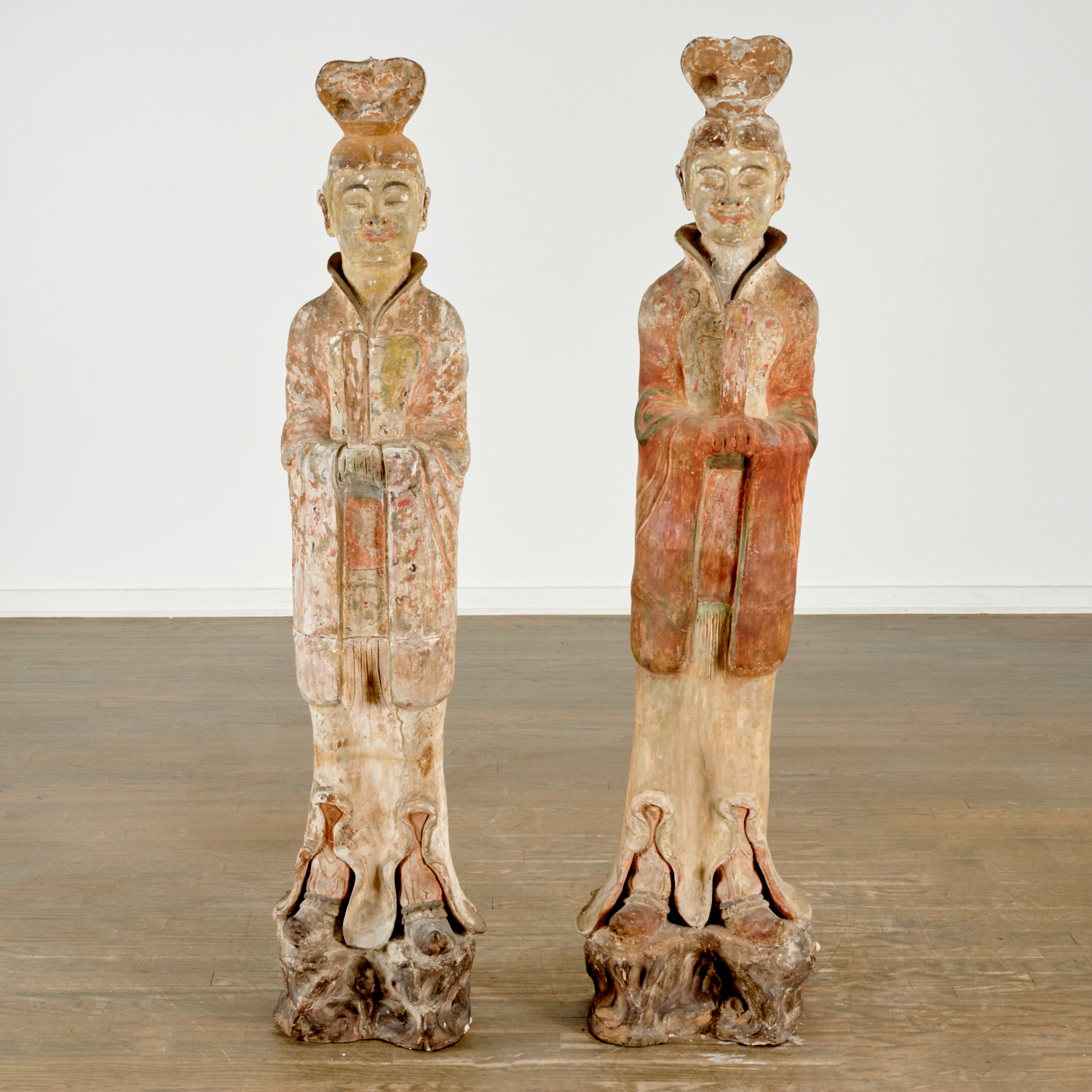 Appraisal: PAIR MASSIVE CHINESE POTTERY FIGURES OF OFFICIALS Tang Dynasty -