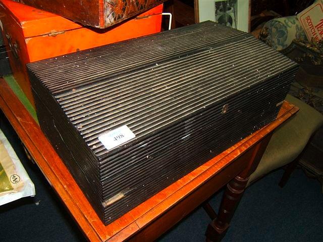 Appraisal: An Anglo-Indian ebony writing box the reeded exterior opening to