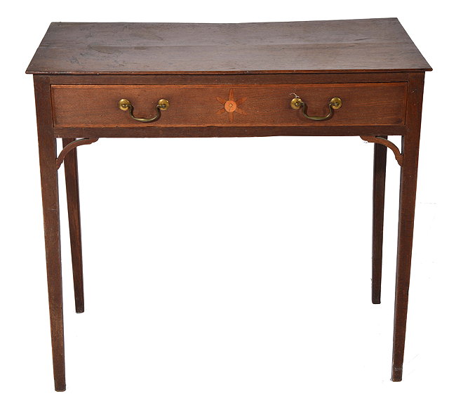 Appraisal: A GEORGE III OAK SIDE TABLE the single frieze drawer