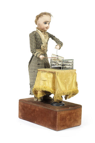 Appraisal: Renou 'Girl with mouse' automaton French circa The bisque Tete