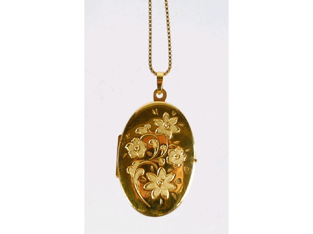 Appraisal: ct GOLD OVAL LOCKET PENDANT floral engraved and the ct