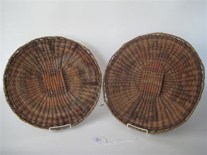 Appraisal: Two Hopi coiled basket trays early th century Each decoarted