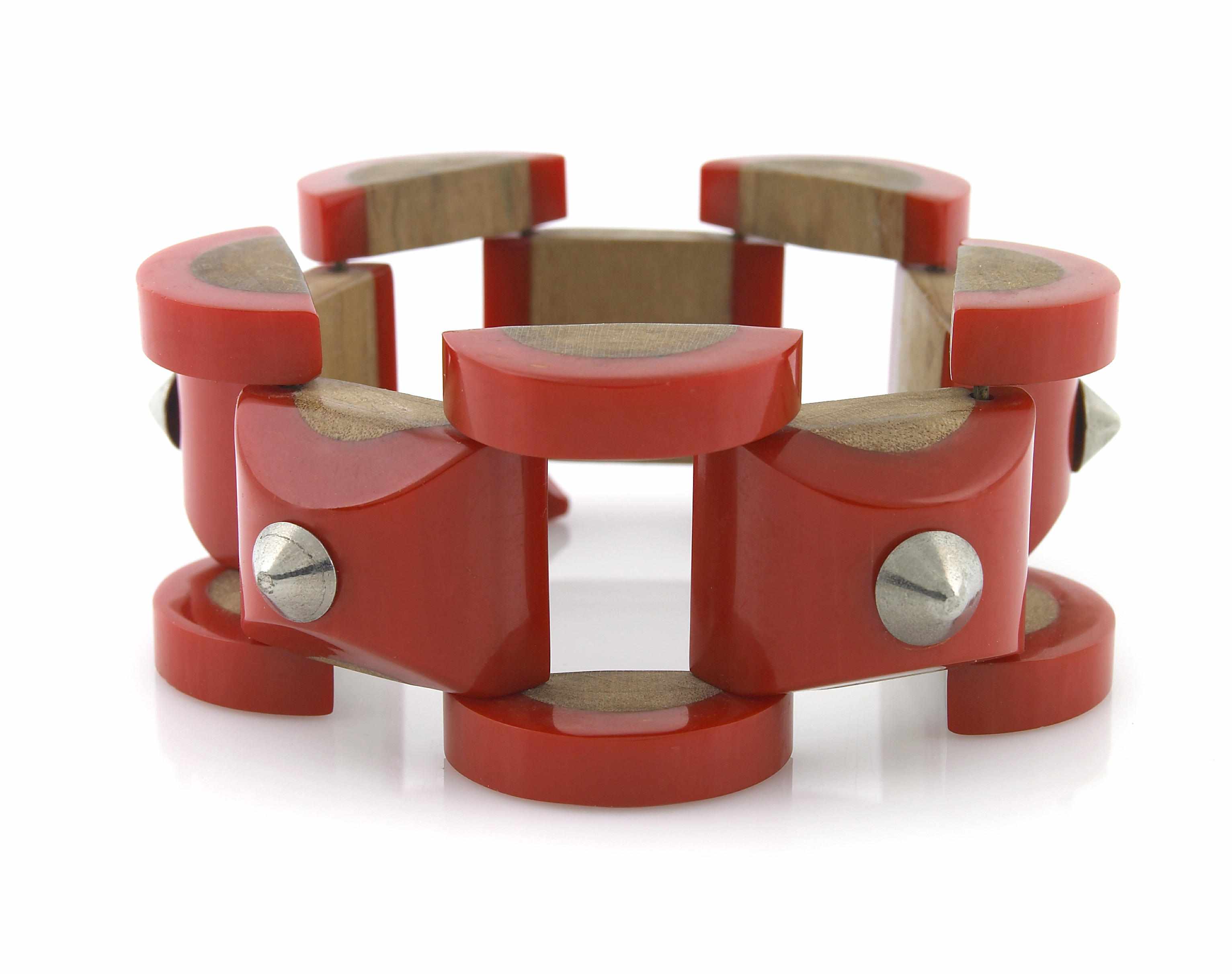 Appraisal: A Bakelite wood and metal ''brick'' link bracelet length in