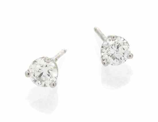 Appraisal: A Pair of Karat White and Diamond Stud Earrings containing