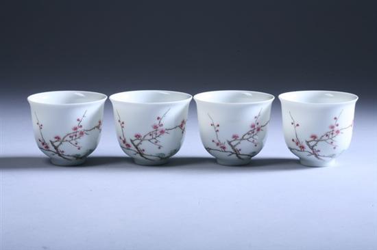 Appraisal: FOUR CHINESE FAMILLE ROSE PORCELAIN TEA CUPS Four-character hallmark Painted