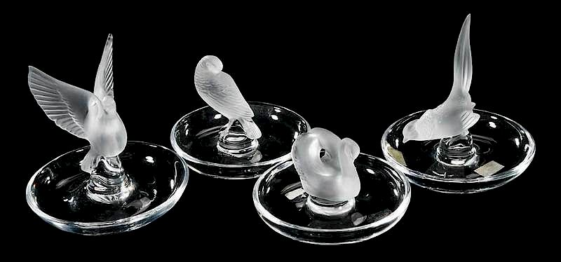 Appraisal: Four Lalique Bird Motif Glass Ashtrays all engraved Lalique France