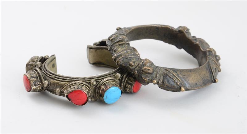 Appraisal: RED AND TURQUOISE GLASS-MOUNTED METAL BRACELET AND A BRONZE RING