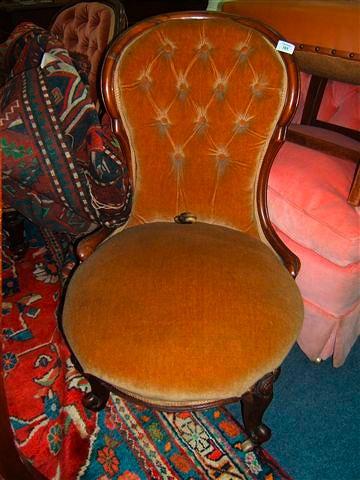 Appraisal: A Victorian mahogany framed spoon back button upholstered occasional chair