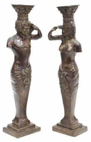 Appraisal: pair Neoclassical style patinated bronze candlesticks depicting draped male and